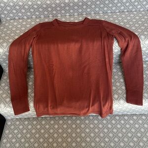 Lululemon sweater with cut out back.